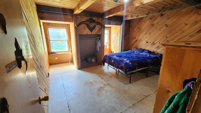 bedroom featuring wood ceiling, beam ceiling, and wood walls