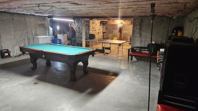 rec room with pool table and concrete flooring