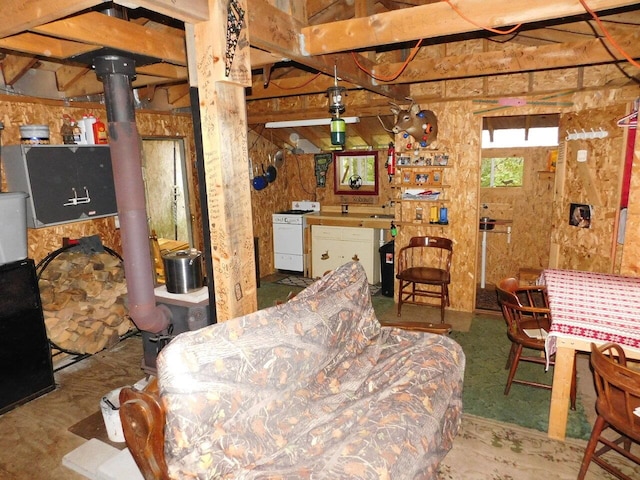 living room featuring a wood stove