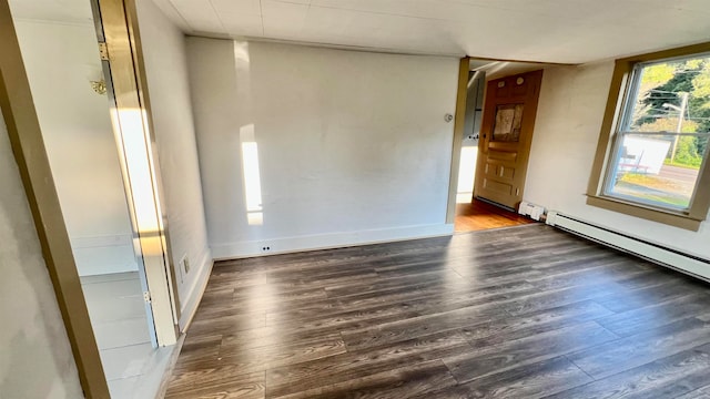 unfurnished room featuring dark hardwood / wood-style floors