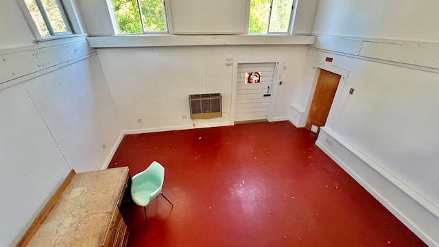 interior space featuring plenty of natural light and heating unit