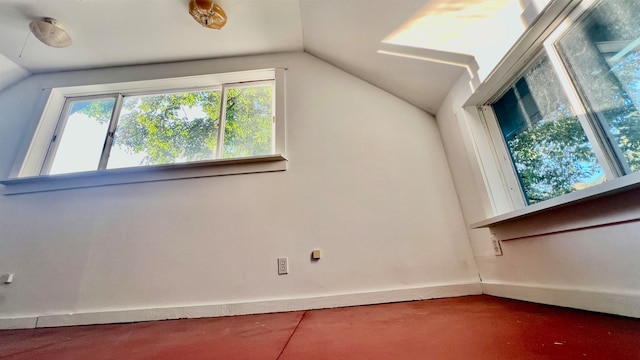 bonus room featuring lofted ceiling