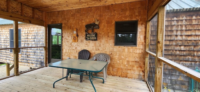 sunroom / solarium with wooden ceiling