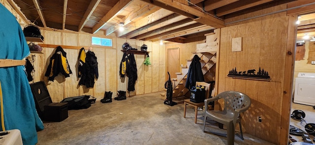 view of horse barn featuring washer / clothes dryer