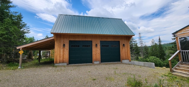 garage featuring a carport