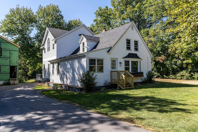 view of front of house with a front yard