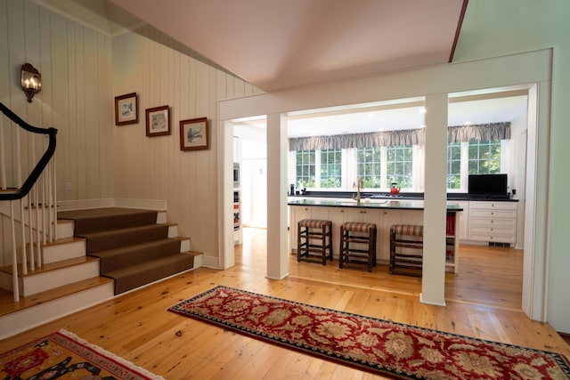 foyer featuring stairway, visible vents, and light wood-style flooring