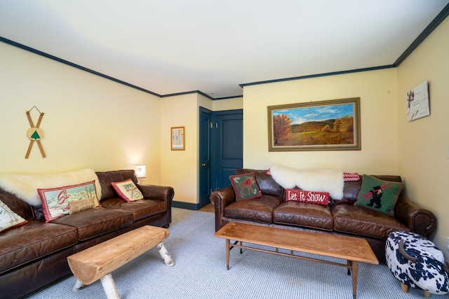 carpeted living room featuring baseboards and ornamental molding