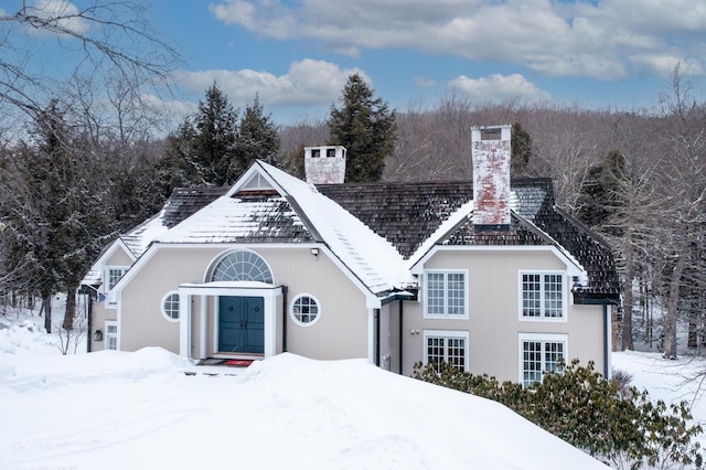 view of front of house with a chimney