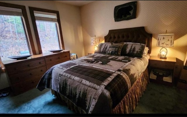 107 Blueberry Ledge Rdg Unit 45, Plymouth, VT 05056 - carpeted bedroom with wallpapered walls