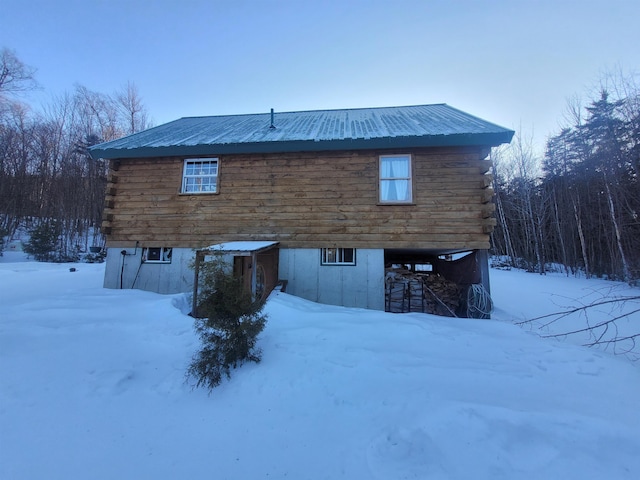 view of snow covered property