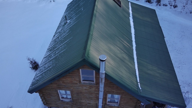 view of snow covered property