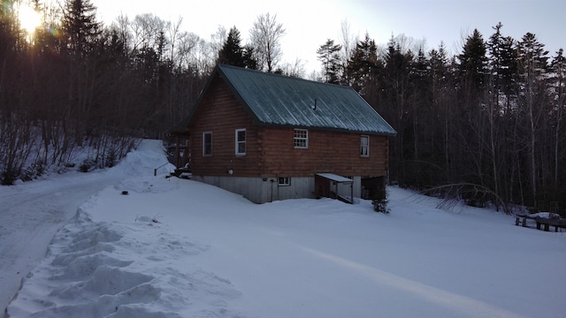 view of snow covered property