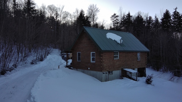 view of snow covered property