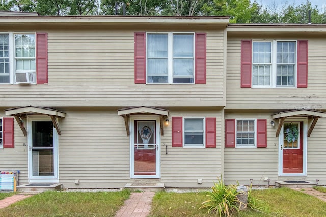 townhome / multi-family property with cooling unit