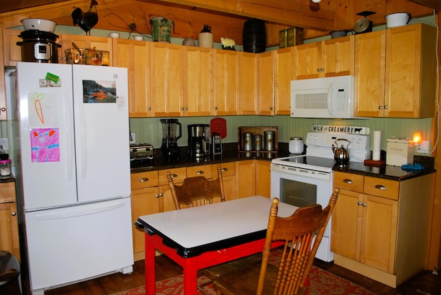 kitchen with dark wood-type flooring and white appliances