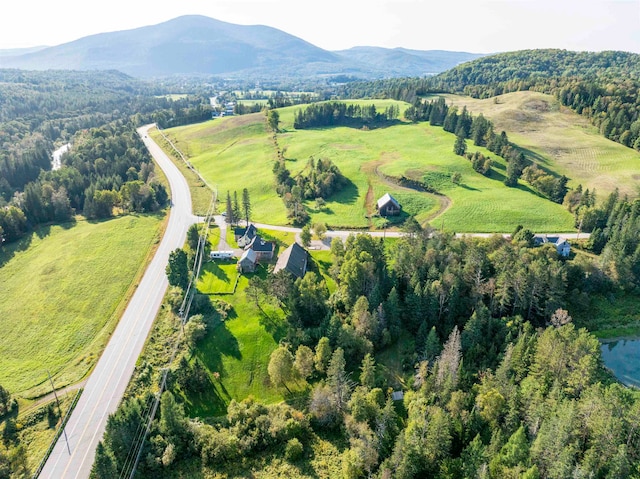 aerial view with a mountain view and a rural view