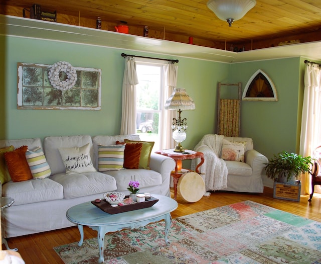 living room featuring wood-type flooring and wood ceiling