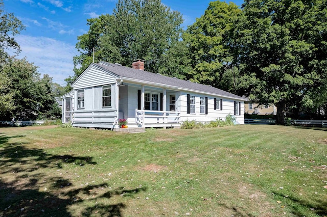 ranch-style house with a front yard