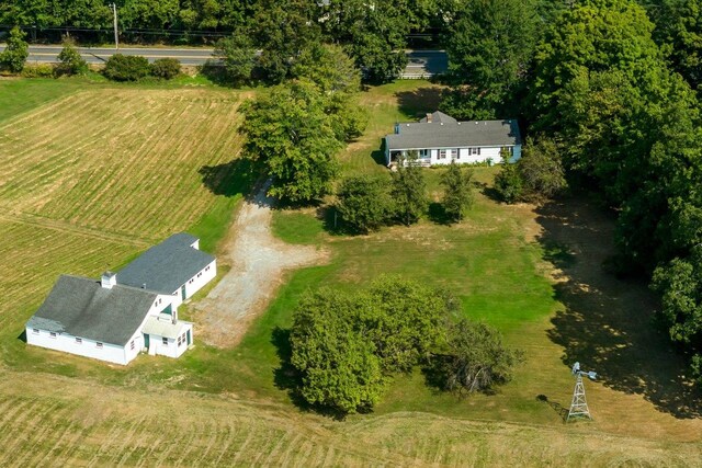 birds eye view of property with a rural view