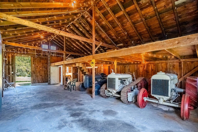 interior space featuring wood walls