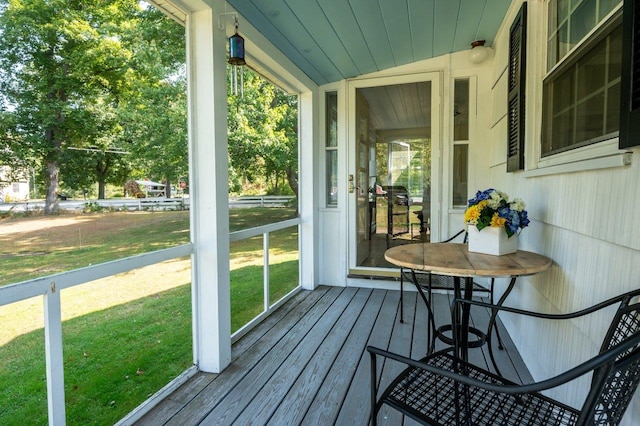 exterior space with a lawn and covered porch