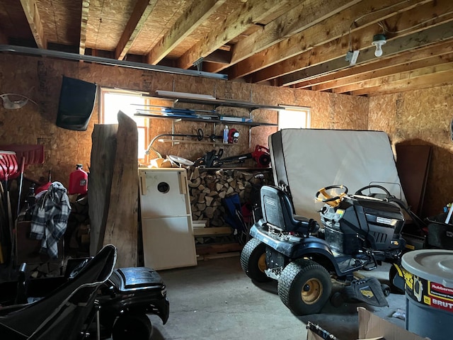 garage with freestanding refrigerator