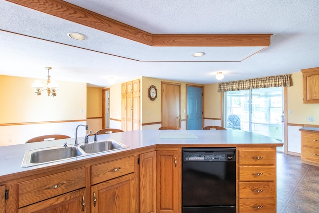 kitchen with hanging light fixtures, a notable chandelier, sink, black dishwasher, and a textured ceiling