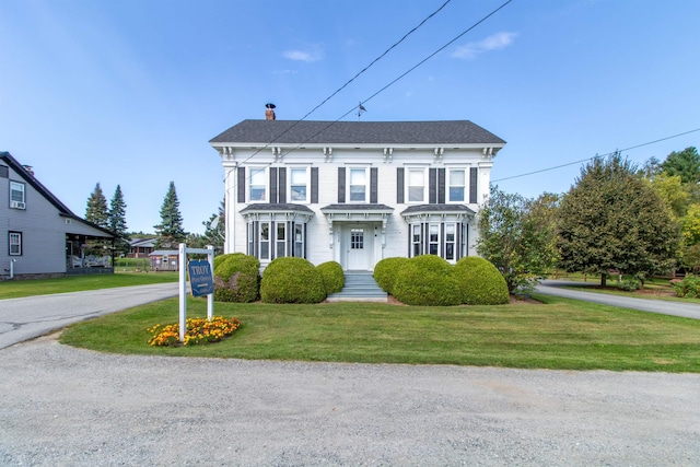 6694 Vt Route 100, Troy, VT 05859 - italianate-style house with roof with shingles, a chimney, and a front yard