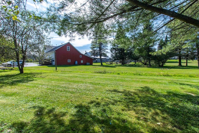 6694 Vt Route 100, Troy, VT 05859 - view of yard featuring an outdoor structure and a barn