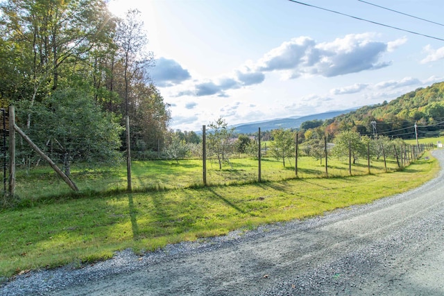 view of street featuring a mountain view and a rural view