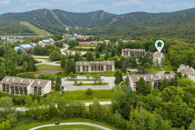 drone / aerial view featuring a mountain view