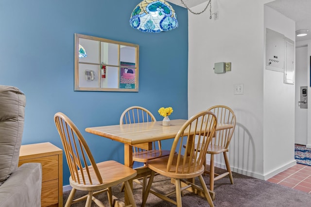 view of carpeted dining space