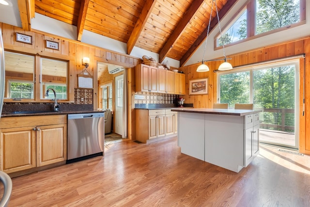 kitchen with dishwasher, beam ceiling, wooden walls, and light wood-style flooring