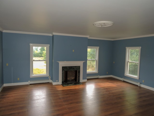 unfurnished living room with crown molding, a premium fireplace, baseboard heating, and dark hardwood / wood-style floors