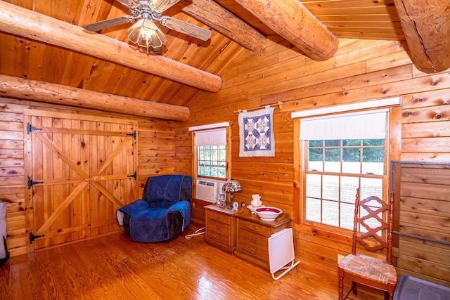 359 Gold Coast Dr, Wakefield, NH 03830 - living area featuring wood finished floors, wooden ceiling, a ceiling fan, cooling unit, and wooden walls