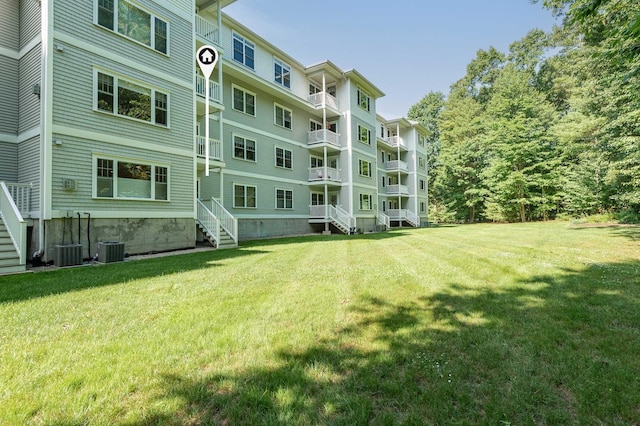 view of building exterior with cooling unit