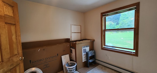 interior space featuring a baseboard heating unit