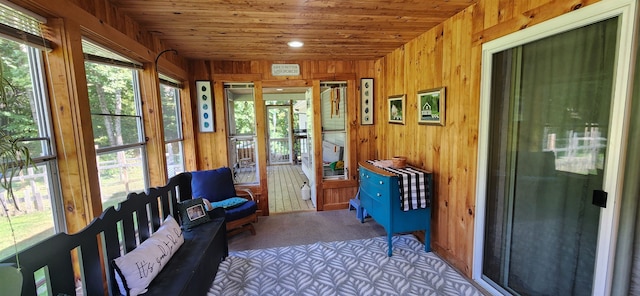 sunroom with wood ceiling