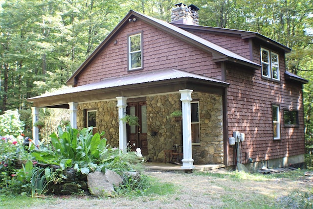 view of front of property featuring covered porch