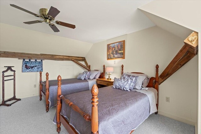 carpeted bedroom featuring vaulted ceiling and ceiling fan