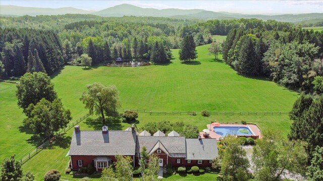 birds eye view of property featuring a rural view