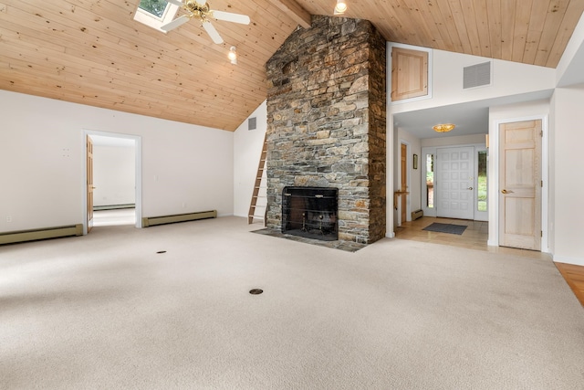 unfurnished living room with a skylight, beam ceiling, and high vaulted ceiling