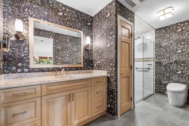 bathroom with walk in shower, vanity, and toilet