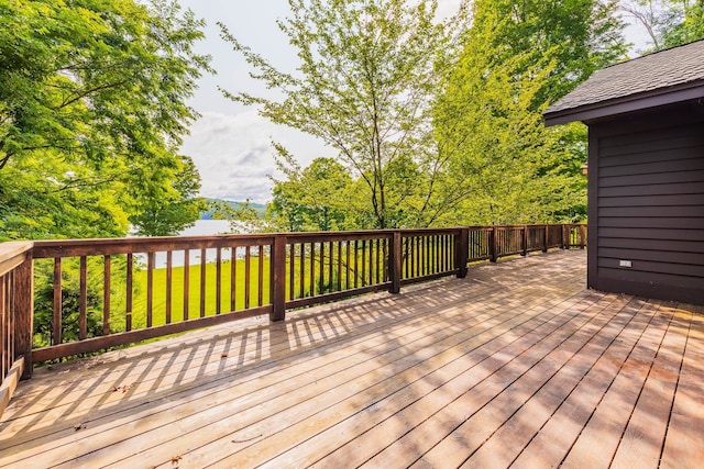 wooden deck with a yard