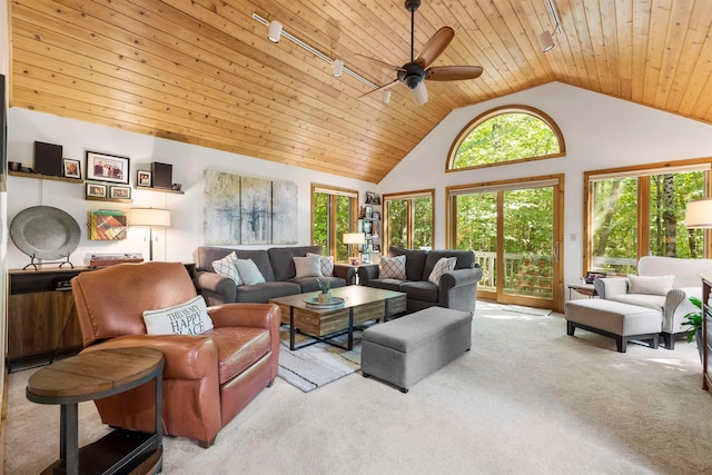 living room featuring ceiling fan, light colored carpet, wood ceiling, and high vaulted ceiling