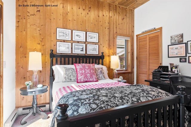 bedroom with wood walls, wooden ceiling, carpet, a towering ceiling, and a closet