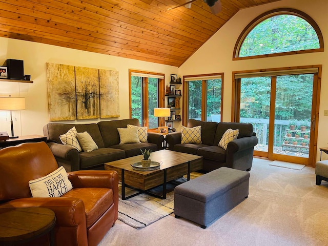 living room with high vaulted ceiling, wood ceiling, and light carpet