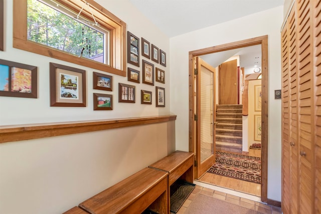 corridor with wood-type flooring