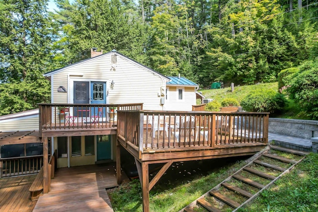 rear view of house with a deck